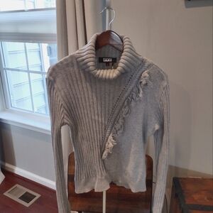 Gray sweater with fringe